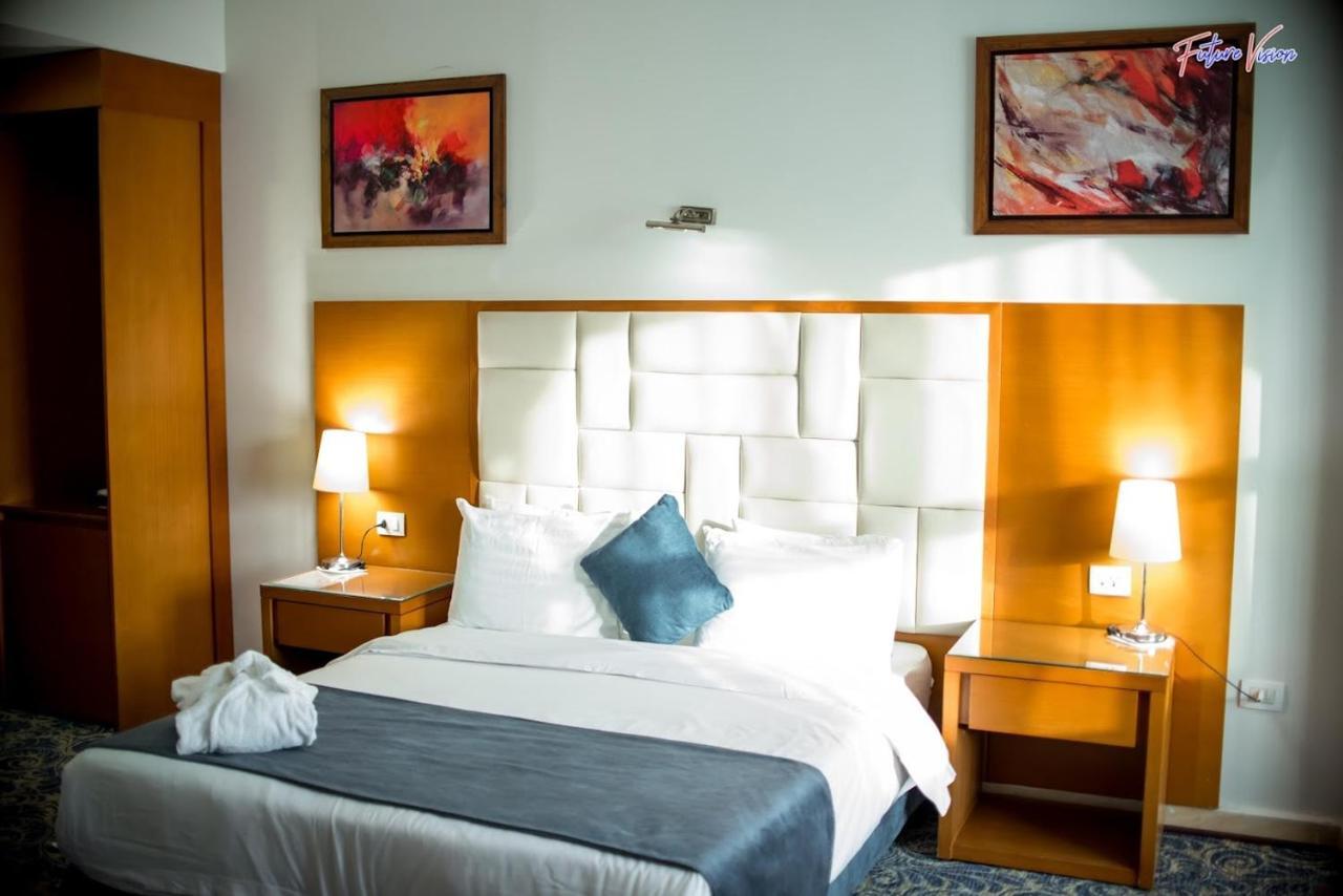 Rehana Plaza Hotel Il Il Cairo Esterno foto A bedroom at the hotel