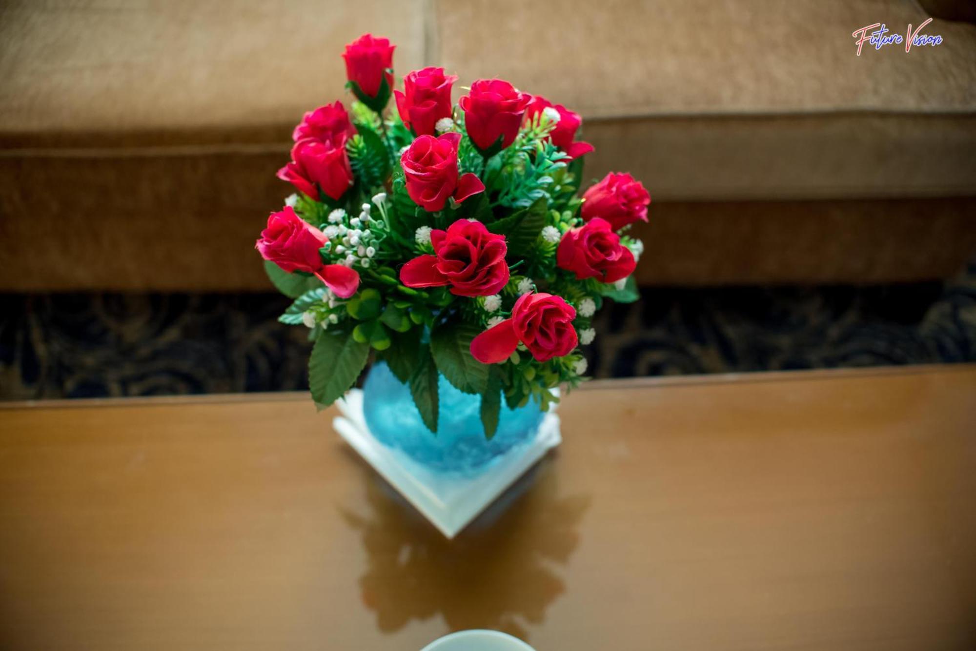 Rehana Plaza Hotel Il Il Cairo Esterno foto A bouquet of roses